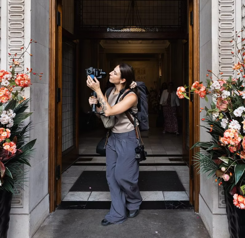 Libby Blunt filming at an event